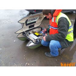 Field crew preparing marine construction equipment