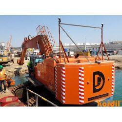 Excavator or dredging equipment at the work site