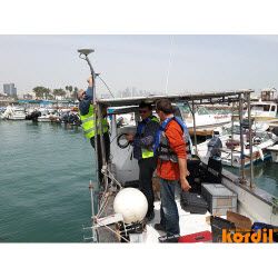 Survey vessel or workboat at a marine project site