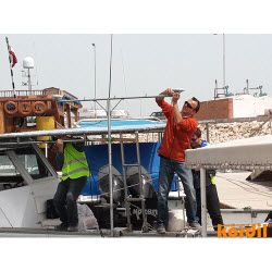 Field crew preparing marine construction equipment