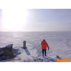 Field survey crew working in snow