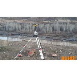 Surveyor and geodetic instrument during field measurements