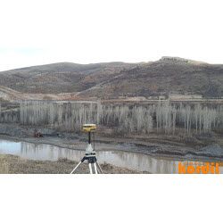 Surveyor and geodetic instrument during field measurements
