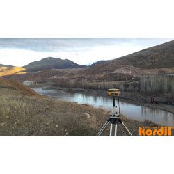 Surveyor and geodetic instrument during field measurements