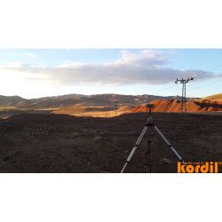 Surveyor and geodetic instrument during field measurements