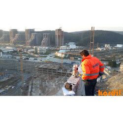 Surveyor and geodetic instrument during field measurements