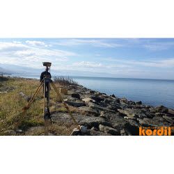 Surveyor and geodetic instrument during field measurements