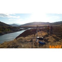 Surveyor and geodetic instrument during field measurements