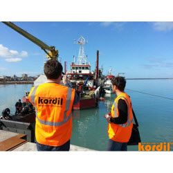 Field crew preparing marine construction equipment