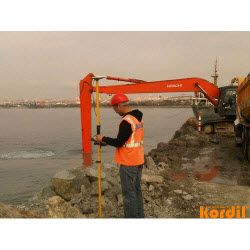 Excavator or dredging equipment at the work site