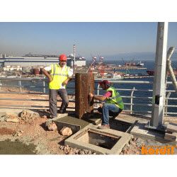 Field crew preparing marine construction equipment
