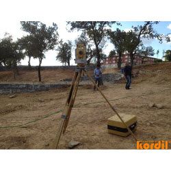 Surveyor and geodetic instrument during field measurements