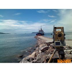 Surveyor and geodetic instrument during field measurements