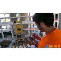 Surveyor and geodetic instrument during field measurements