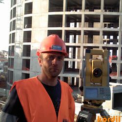 Surveyor and geodetic instrument during field measurements