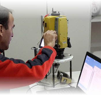 Surveyor and geodetic instrument during field measurements