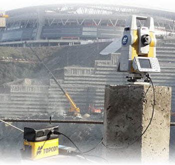 Surveyor and geodetic instrument during field measurements