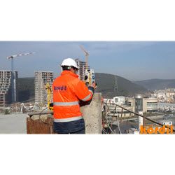 Surveyor and geodetic instrument during field measurements