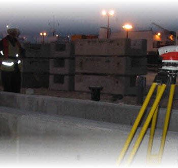 Surveyor and geodetic instrument during field measurements