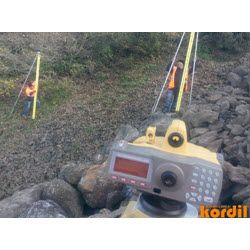 Surveyor and geodetic instrument during field measurements