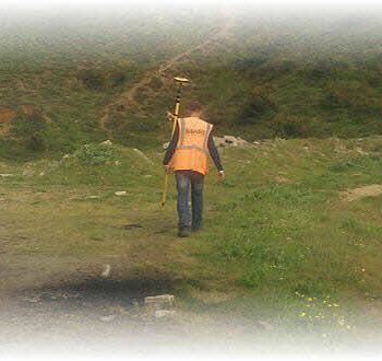 Surveyor and geodetic instrument during field measurements