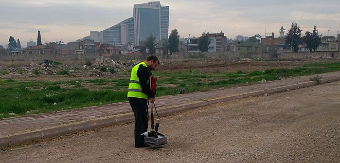 Kordil operator conducting a ground-penetrating radar survey along a road