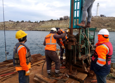 Drilling rig and crew during ground investigation